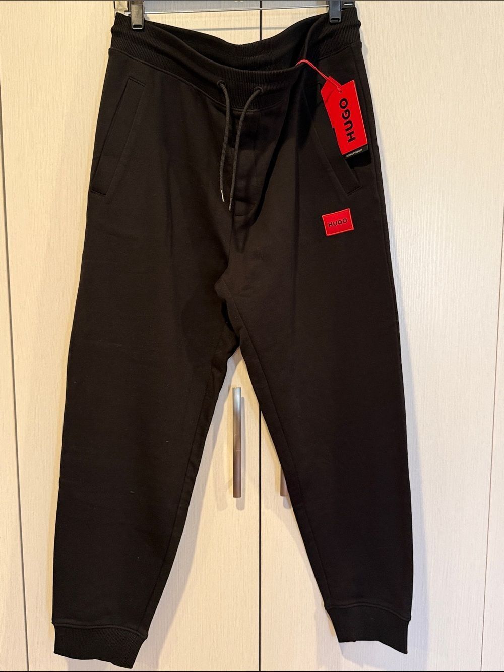 HUGO Black Jogger Sweatpants with Red Logo Tags